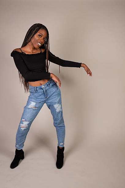 istock Young Black Woman posing in studio 2210287624