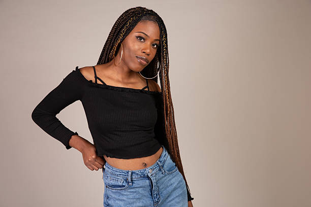 istock Young Black Woman posing in studio 2210287694