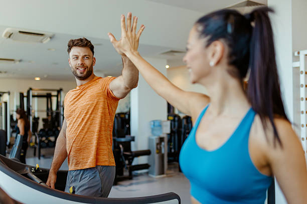 istock Gym Partners Motivating Each Other 2210287832