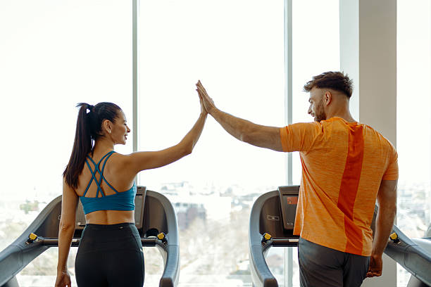 istock High-Five Victory Moment in Gym 2210287836