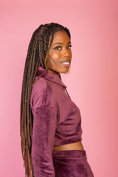 istock n American woman on pink background 2210288590