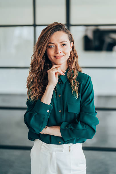 istock Confident Businesswoman in a Bright Office Setting 2210289827