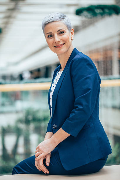 istock Confident Businesswoman in a Bright Office Setting 2210289838