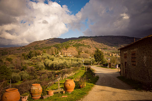 Hilly landscape of Montefeltro against partly cloudy sky