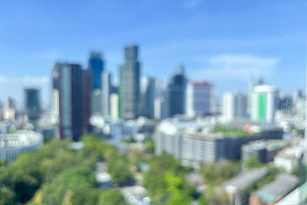istock Abstract blur cityscape skyline building with blue sky background 2210299989