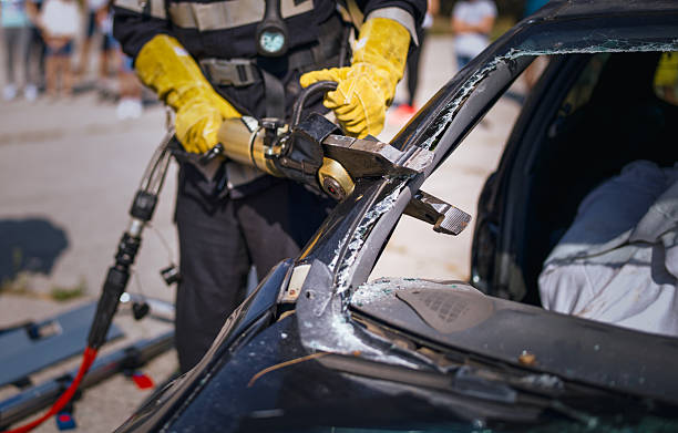 istock Rescue team saving people from crashed cars in crash accident. 2210300055