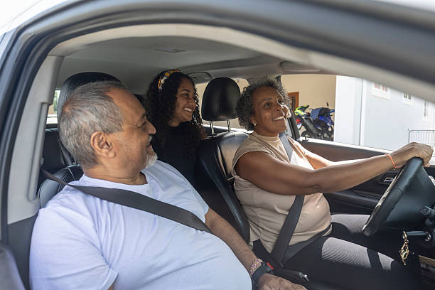 istock Family in car getting ready to leave home 2210307580