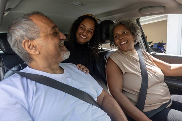 istock Family in car getting ready to leave home 2210307620
