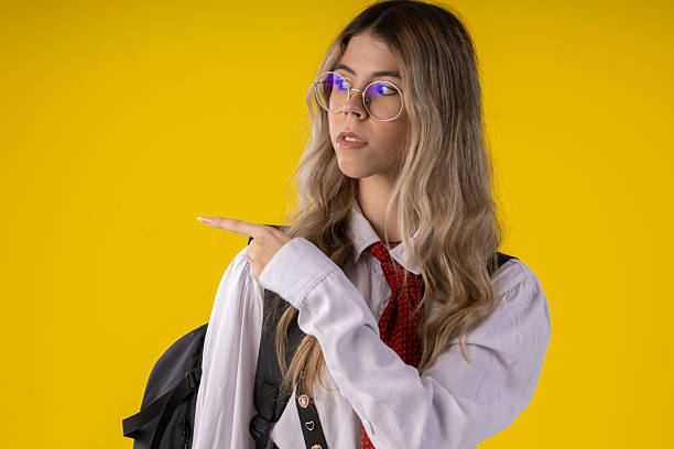 istock young woman  in studio photo with infinite background, making funny poses 2210308130