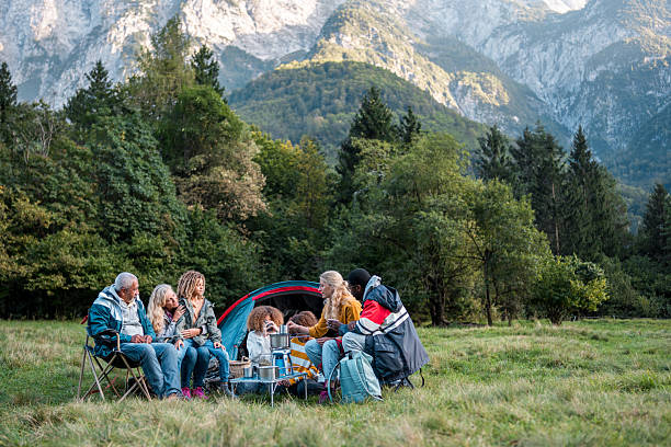 istock Multiethnic Family Enjoying Camping Trip in Mountains 2210311960