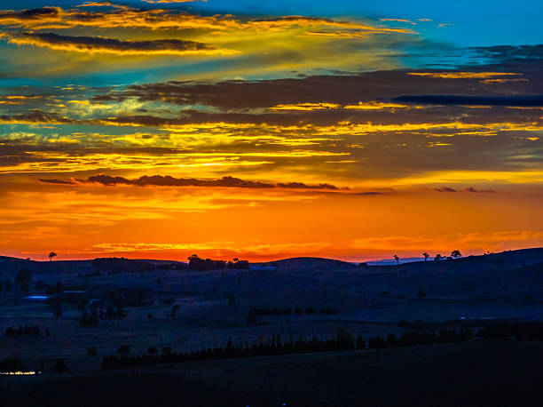Aerial Sunrise landscape views over the countryside with high cloud at Blayney in the Central West of NSW, Australia.