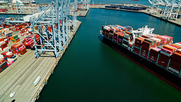 istock Loaded Container Ship Docking in Port of Long Beach - Aerial 2210314586