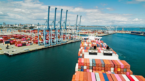 istock Loaded Container Ship Approaching Dock in Port of Long Beach - Aerial 2210314593