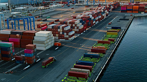 istock High Angle View of UTR Driving Through Container Terminal in Port at Dusk 2210314612