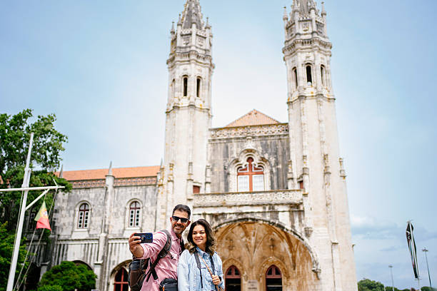 istock Beautiful tourist couple taking selfie 2210314641