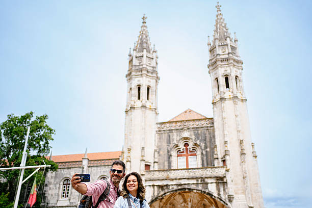 istock Beautiful tourist couple taking selfie 2210314642