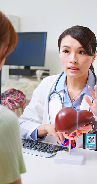 istock asian female liver disease consult 2210314971