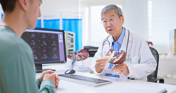 istock asia doctor explain liver condition 2210316164