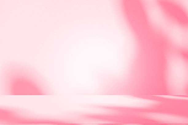 istock Wall interior background, studio, and backdrops show products. with shadow from window color white and pink light. background for text insertion and presentation of product 2210324257