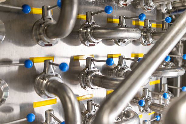 istock Milking machine in dairy factory 2210327710