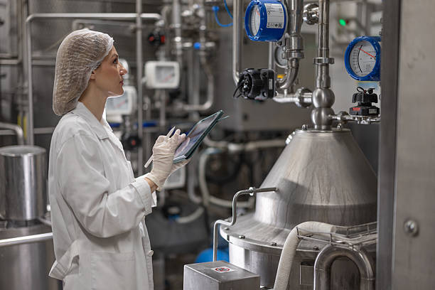 istock Controlling production process at modern milk plant 2210327785