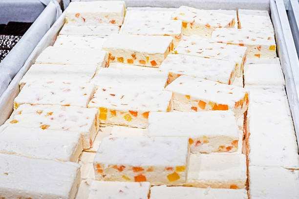 Turkish delight with tropical fruits cut into rectangles