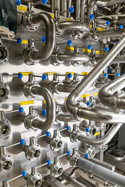 istock Milking machine in dairy factory 2210328168