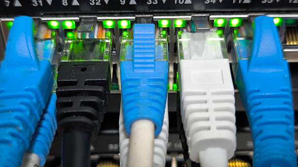 istock Connecting copper wires through RJ45 heads. Connecting computer systems. Lan network. 2210335784