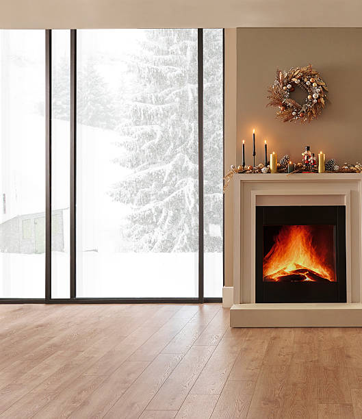 istock Christmas tree, ornaments, fireplace and interior room style, brick wall background, snowy forest view. 2210336341