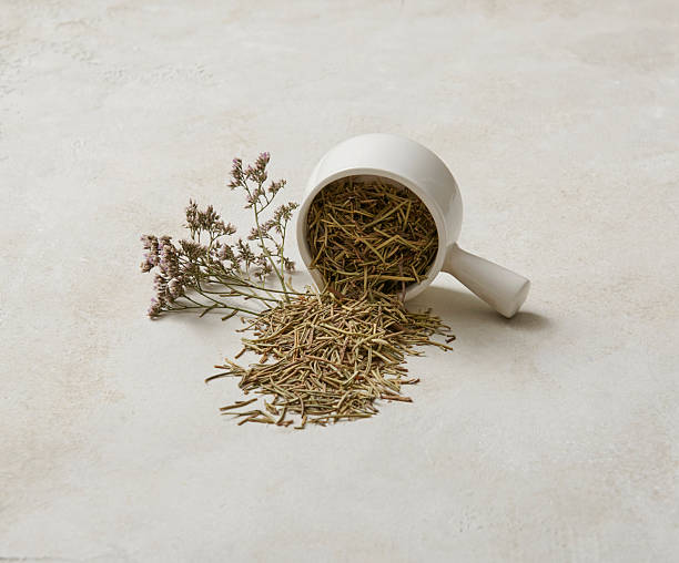 istock Various herbs such as mint and thyme on the decorative table style, spoon, cup and plate, healthy food. 2210338084