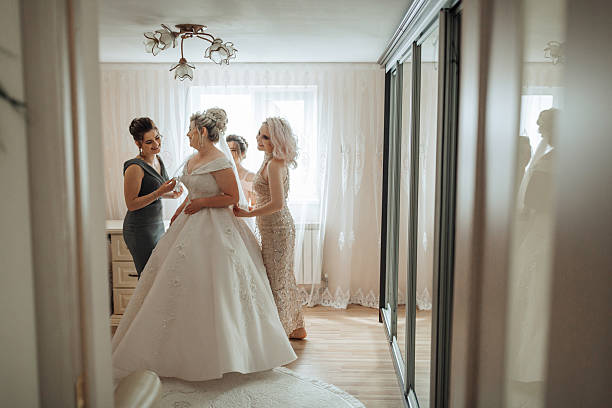 istock A bride and her bridesmaids are getting ready for the wedding 2210338822