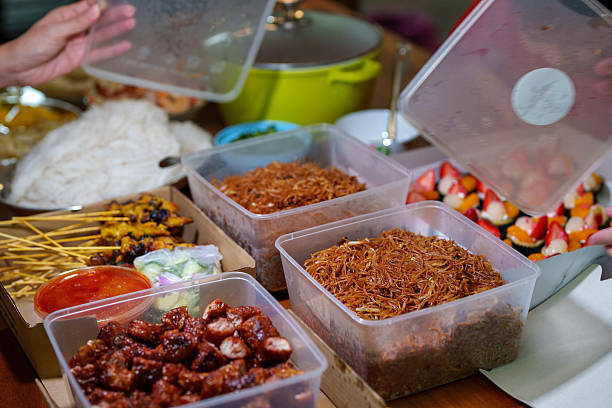 istock Assorted Malaysian Dishes Served in Containers for Potluck Party 2210339505