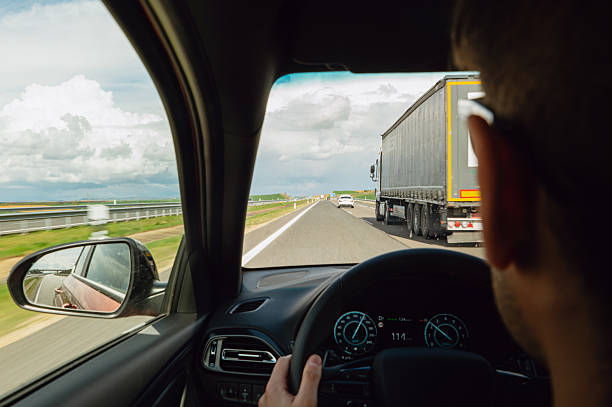 istock Overtaking a truck on a highway 2210342433