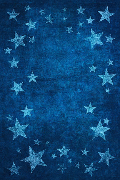 istock A deep blue textured background adorned with a scattering of stars 2210342904