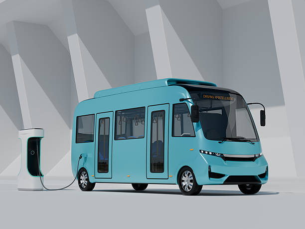 istock Electric Bus parking on monolithic background 2210346836