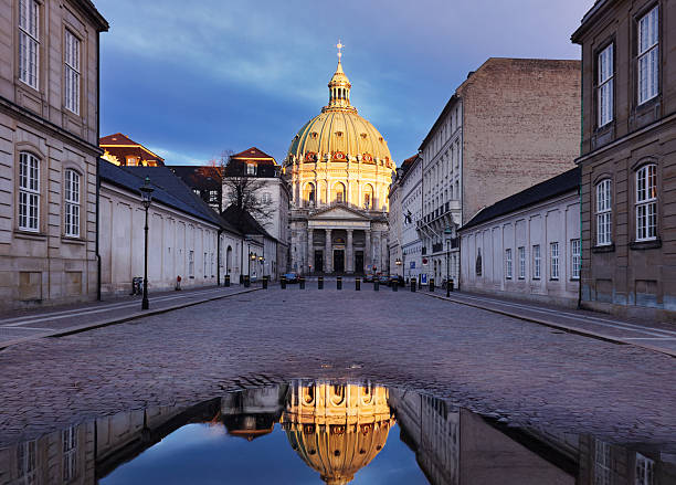 Copenhagen - Sunrise reflection Frederik's Church in Amalienborg square, Denmark