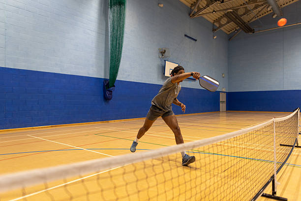 istock Player Engaged in a Pickleball Rally 2210353826