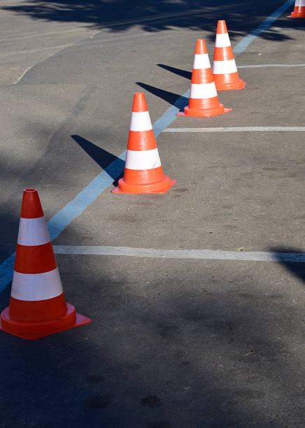 istock The sunlight on parking cone on the monochrome background. 2210355857