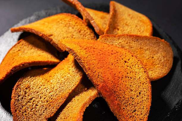 istock Rye rusks. bread snack for beer. Rye bread croutons. Beer snack. Fried rye croutons. 2210356330