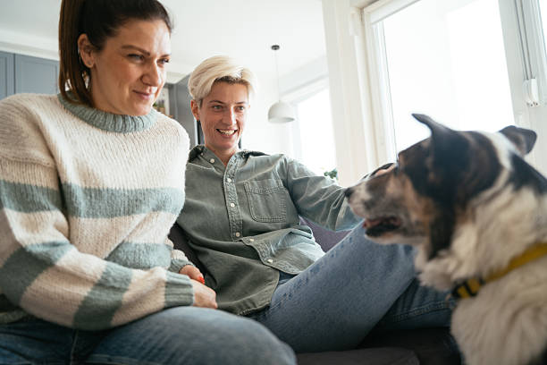 istock Lesbian couple with dog 2210359326