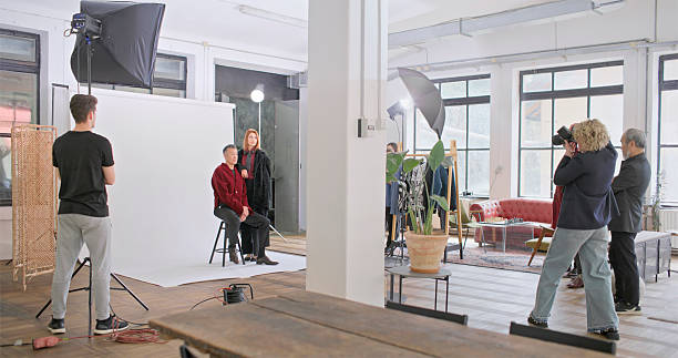 istock Professional Photography Studio Setup With Crew Working On Commercial Shoot 2210363413