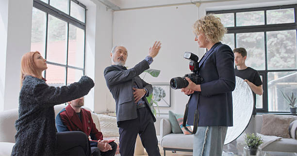istock Diverse Creative Team Collaborating During Photo Production Meeting In Modern Studio Space 2210363421