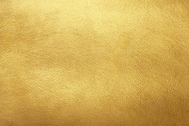 istock Gold metal textured background. Rough golden paint foil texture. Luxurious gold paper template for text design, lettering, scrapbooking, posters. 2210364900