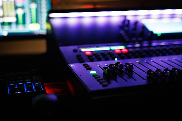 istock A purple mixing board with a green button on it 2210369267