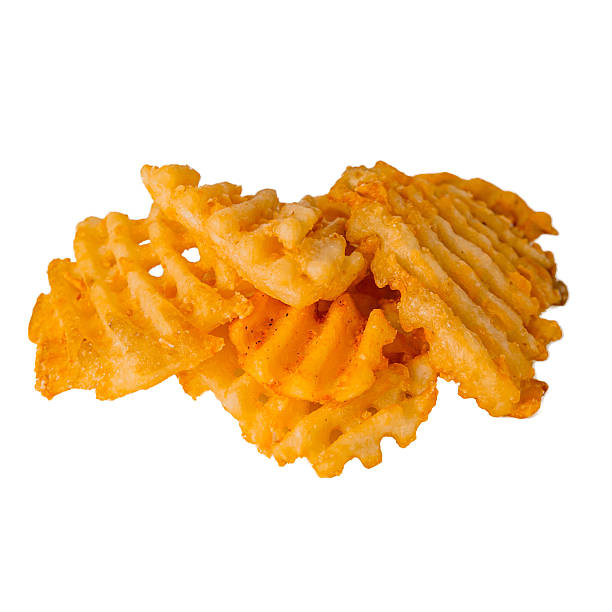 istock Crispy golden waffle fries stacked white background, isolated shot studio lighting to highlight crunchy ridged texture 2210370206