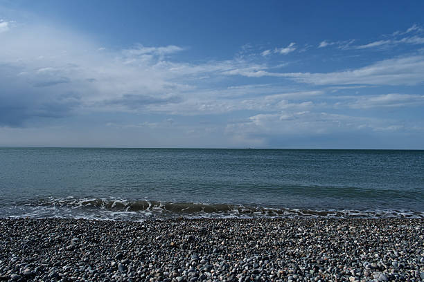 Blue sea and cloudy sky, natural background. Sky over sea