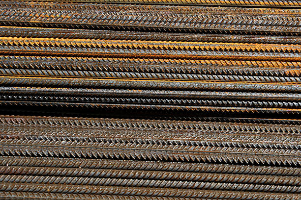 istock Steel rods in the construction site, close-up. Reinforcing bars. Abstract background 2210375745
