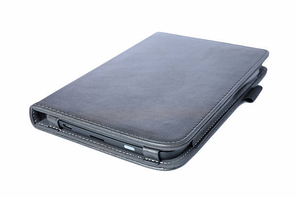 istock Closed e-book in black leather cover 2210375924