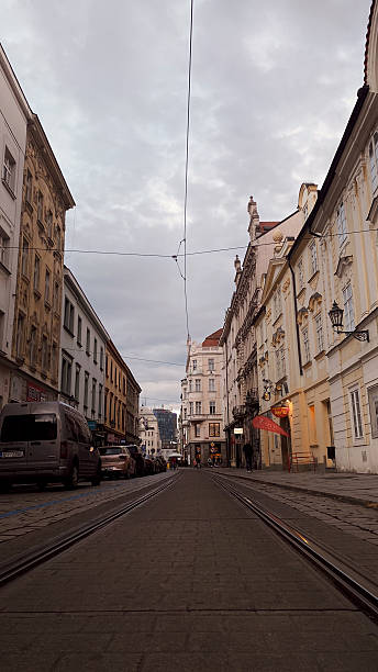 istock Evening stroll down a historic cobblestone street in Prague, Czech Republic 2210378004