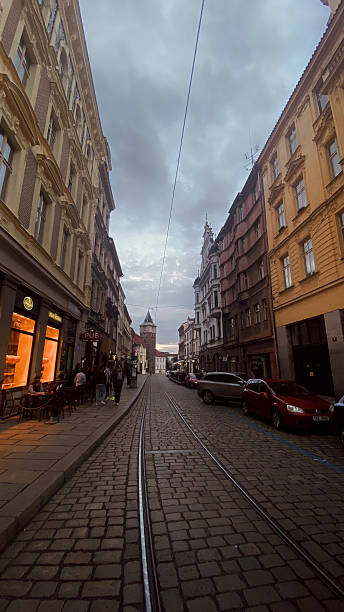 istock Evening stroll down a historic cobblestone street in Prague, Czech Republic 2210378007